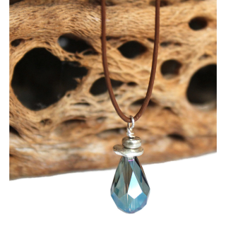 peacock-crystal-leather-necklace-on-textured-wood