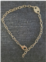 hypoallergenic chain tag anklet on denim