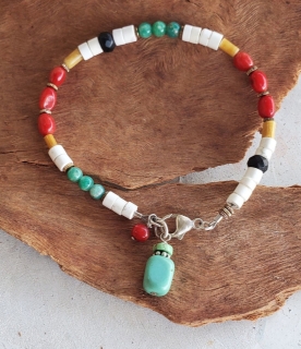 multi color gemstone silver clasp bracelet  on wood