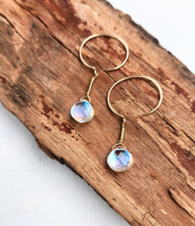 gold mini hoop rainbow quartz earrings on wood