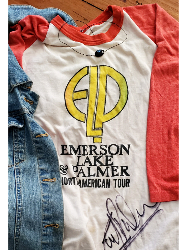 black necklace with an emerson lake & palmer tee shirt