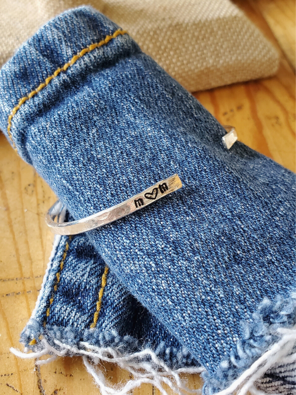 sterling mom cuff on denim roll