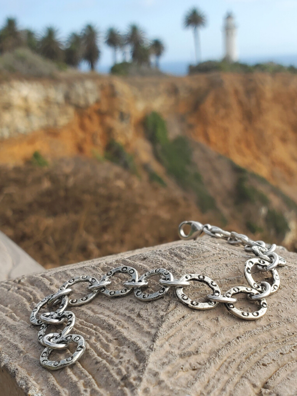 silver artisan bracelet in nature setting