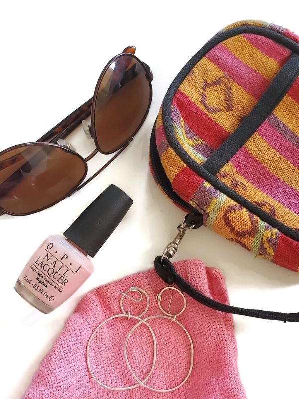 sunglasses, fingernail polish and hoop earrings