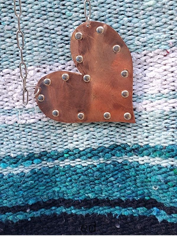 mexican blanket and riveted metal heart necklace