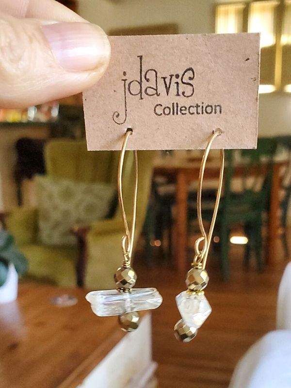 holding cool  quartz earrings