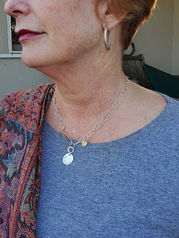 wearing outfit with mixed metal beloved necklace