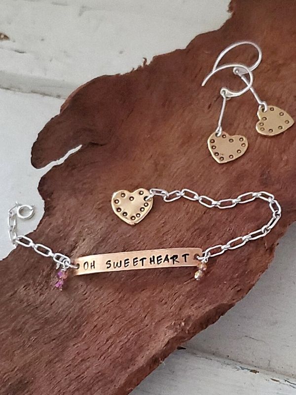 sweetheart jewelry on wood