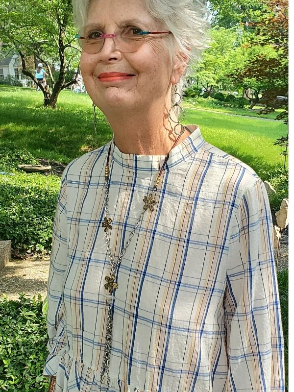 wearing flower chain necklace outside