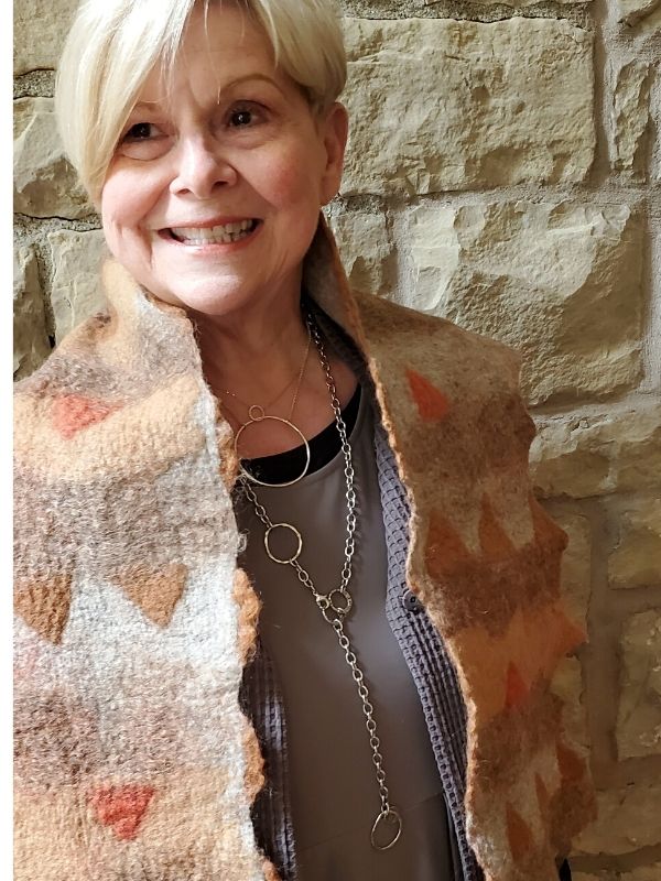 wearing organic layered silver jewelry