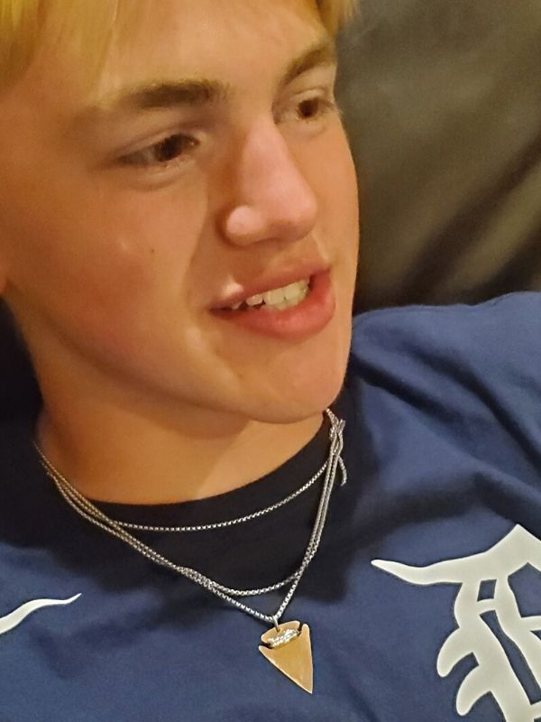  bronze arrowhead necklace worn 