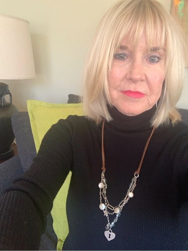 long necklace with turtleneck