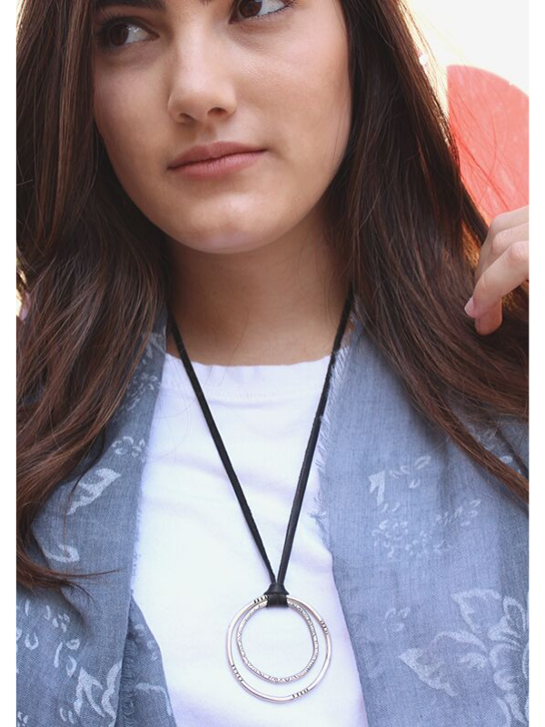 black and silver necklace on model