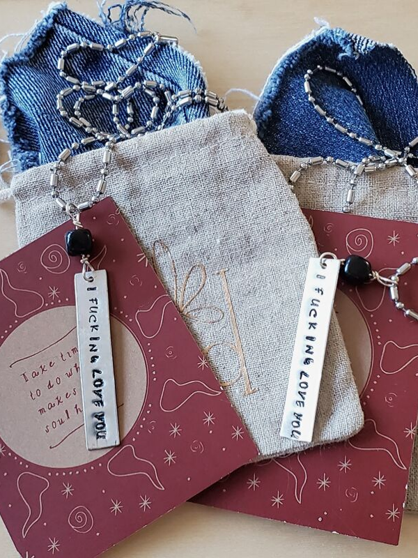 i fucking love you necklaces on gift bag