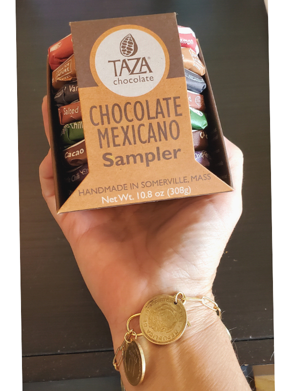 coin bracelet on hand holding chocolate